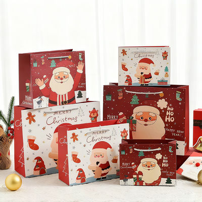 اندازه های سفارشی چاپ شده کیسه های کریسمس کرافت کیسه های هدیه لوکس با دسته نوار